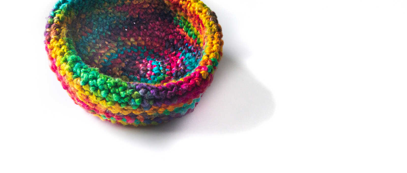 crocheted bowl in variegated silk yarn