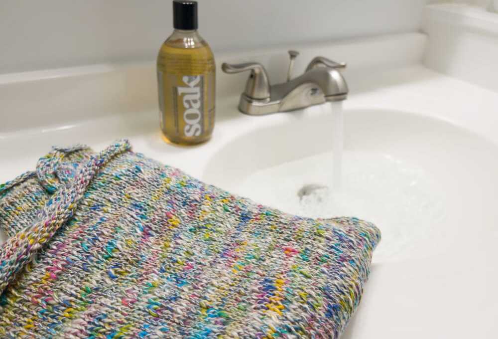 blocking a knitted sweater with Soak