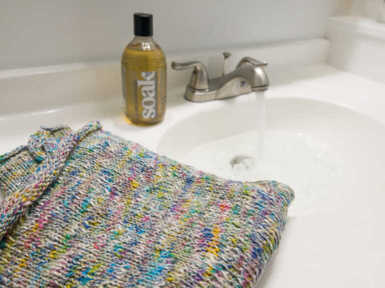 blocking a knitted sweater with Soak